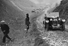 Riley of CJ Johannson competing in the MCC Sporting Trial, Litton Slack, Derbyshire, 1930. Artist: Bill Brunell