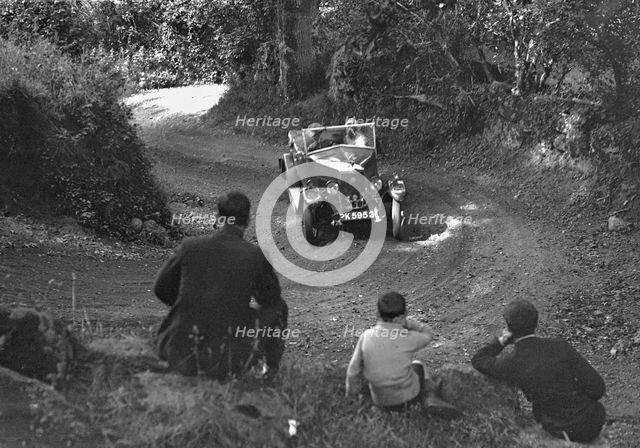 Riley of CJS Montague-Johnson, B&HMC Brighton-Beer Trial, Simms Hill, Ilsington, Devon, 1930. Artist: Bill Brunell.