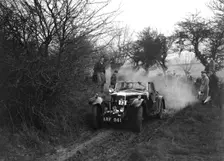 Riley of C Beddow at the Sunbac Colmore Trial, near Winchcombe, Gloucestershire, 1934. Artist: Bill Brunell