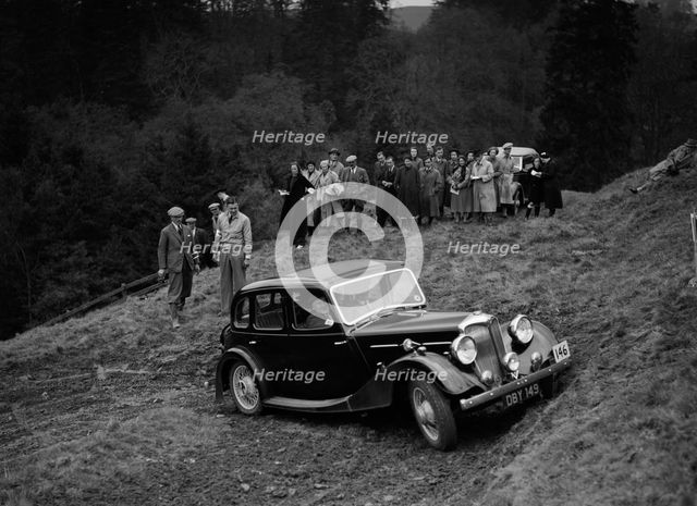 Riley of F Broomfield competing in the MCC Edinburgh Trial, Roxburghshire, Scotland, 1938. Artist: Bill Brunell.