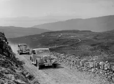 Riley of Miss F Walker leading a Hudson Eight at the RSAC Scottish Rally, 1936. Artist: Bill Brunell