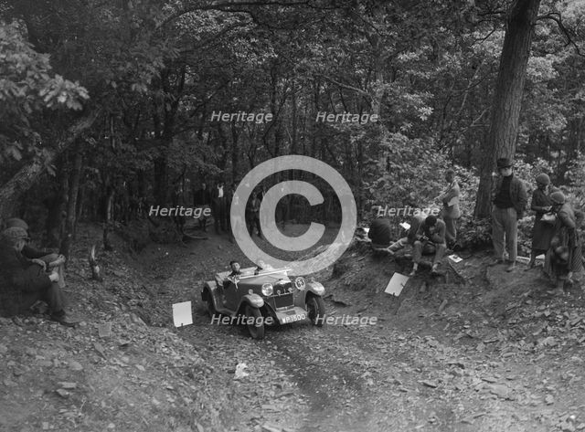 Riley Lynx taking part in a motoring trial, c1930s. Artist: Bill Brunell.