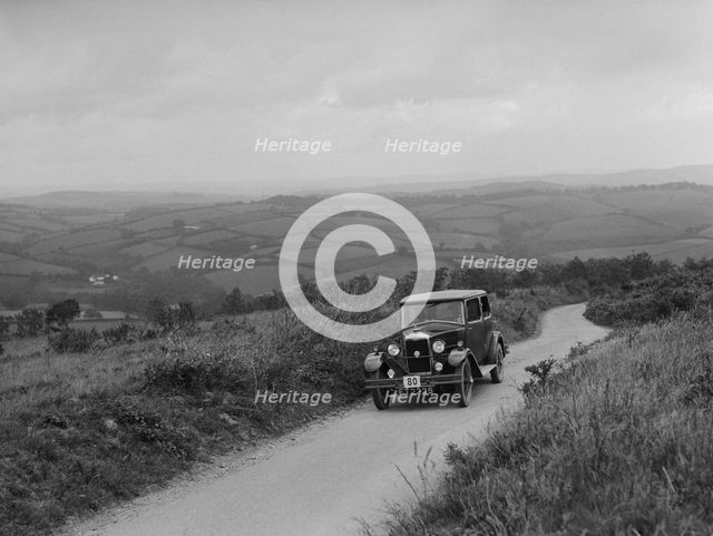 Riley Monaco saloon of VJ Fishleigh competing in the MCC Torquay Rally, 1938. Artist: Bill Brunell.
