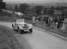 Riley Sprite 2-seater of Mrs TB Hague competing in the South Wales Auto Club Welsh Rally, 1937 Artist: Bill Brunell