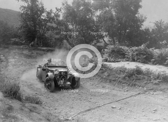 Riley tourer competing in the Barnstaple Trial, c1935. Artist: Bill Brunell.