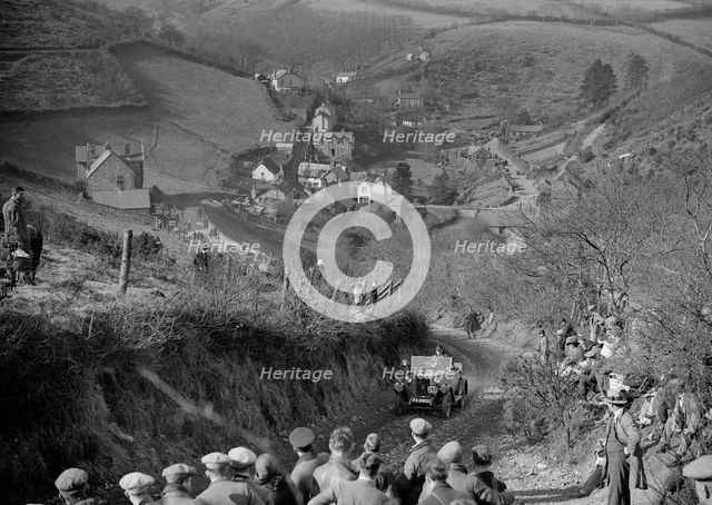 Riley Tourer competing in the MCC Lands End Trial, Beggars Roost, Devon, 1928 or 1929. Artist: Bill Brunell.