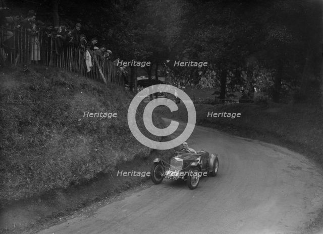 Riley TT Sprite competing in the Shelsley Walsh Hillclimb, Worcestershire, 1935. Artist: Bill Brunell.