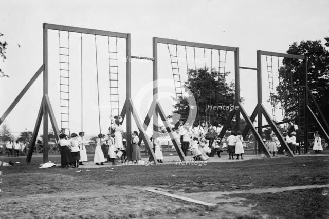 Rings and poles, Bronx Park, 1911. Creator: Bain News Service.