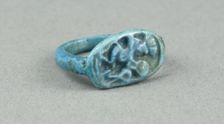 Ring: Figure of Bes playing frame drum, sa (protection) before him, Egypt, New Kingdom, Dynasty 18.. Creator: Unknown