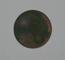 Riot penny charred during the 1921 Tulsa Race Massacre, 1915. Creator: United States Mint