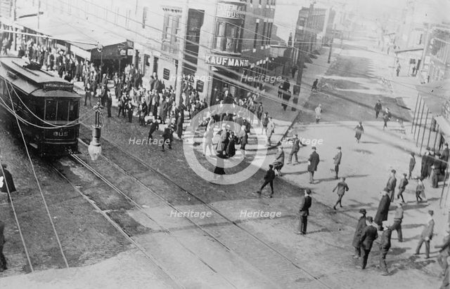 Rioters stoning a trolley car, Philadelphia, 1910. Creator: Bain News Service.