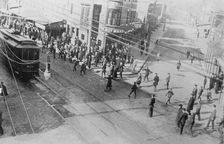 Rioters stoning a trolley car, Philadelphia, 1910. Creator: Bain News Service