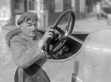 RJ Sully behind the wheel of a HE 14/40, Brooklands. Artist: Bill Brunell