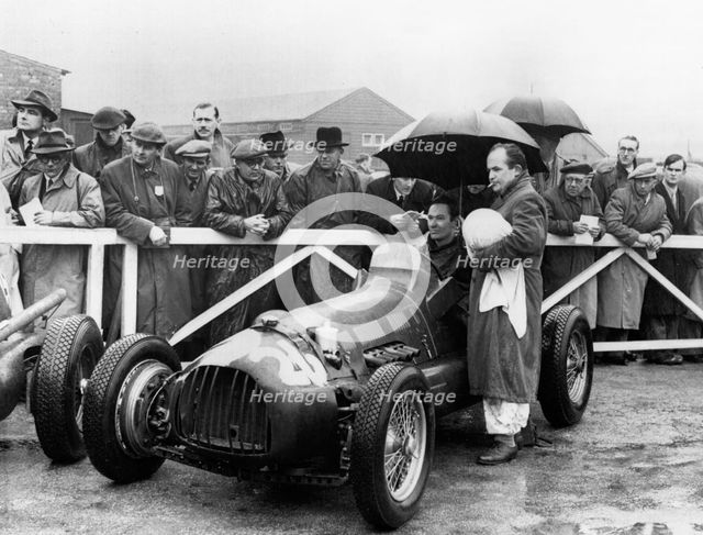 RRA Supercharged Special , G.N. Richardson in paddock at Aintree 1954. Creator: Unknown.