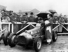 RRA Supercharged Special , G.N. Richardson in paddock at Aintree 1954. Creator: Unknown