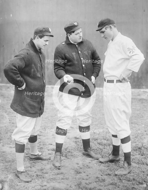Rube Marquard standing at right, Libe Washburn in center & Mike..., New York, NL (baseball), 1911 Creator: Bain News Service.