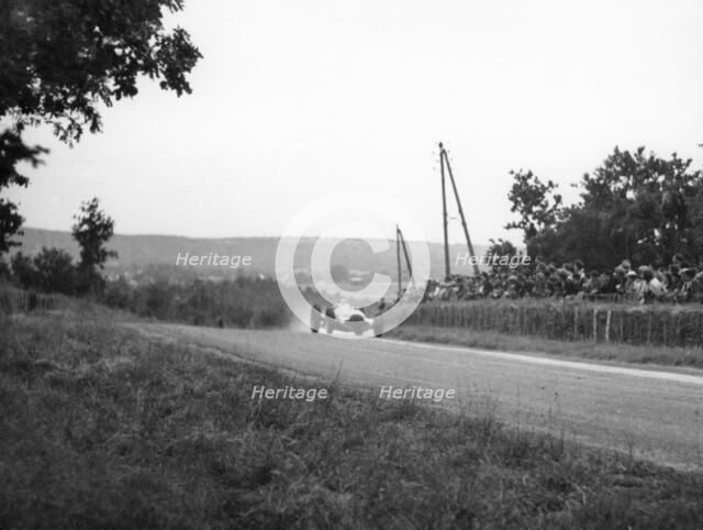 Rudolf Caracciola in his Mercedes, French Grand Prix, Rheims, 1938. Artist: Unknown