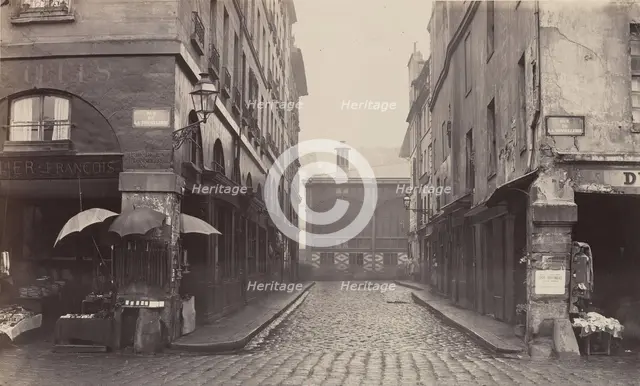 Rue du Contrat-Social, de la rue de la Tonnellerie, 1864-1865. Creator: Charles Marville.