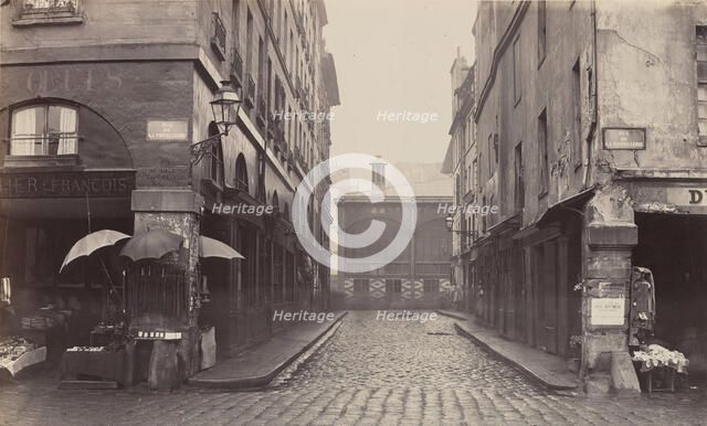 Rue du Contrat-Social, de la rue de la Tonnellerie, 1864-1865. Creator: Charles Marville.