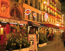 Rue du Louvre at night, Paris, France. Creator: Peter Thompson