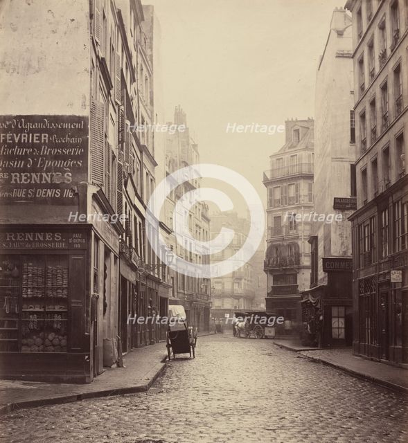 Rue des Lombards, from the rue des Lavandières Sainte-Opportune, 1864. Creator: Charles Marville.