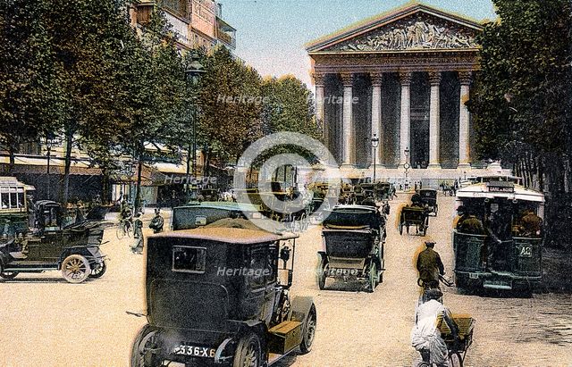 Rue Royale and the Madeleine, Paris, with cars and a motorbus on the street, c1900. Creator: Unknown.