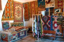 Rugs and scarves at a monastery, North Cyprus. Creator: Peter Thompson