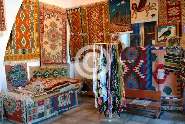 Rugs and scarves at a monastery, North Cyprus. Creator: Peter Thompson.