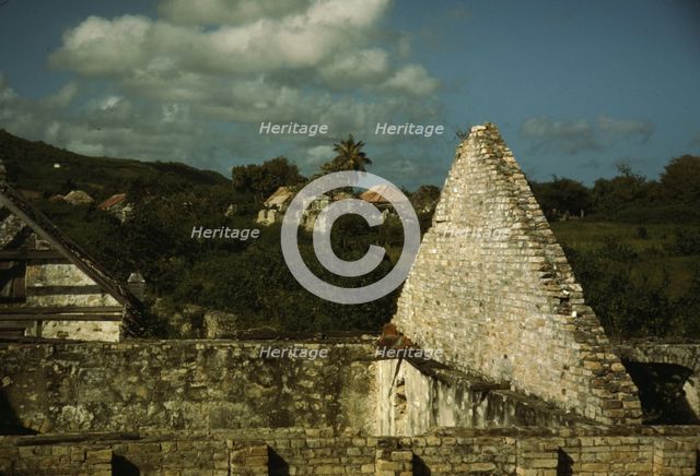 Ruins of an old sugar mill and plantation house, vicinity of Christiansted, Saint Croix, V.I., 1941. Creator: Jack Delano.