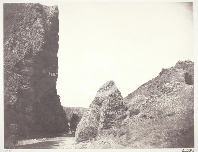 Ruisseau coulant entre une falaise et des rochers, 1854, printed 1978. Creator: Edouard Baldus.