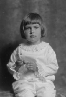 Rumsey, Charles Cary, Mrs., child of, portrait photograph, 1914 May 11. Creator: Arnold Genthe