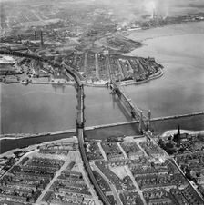 Runcorn Railway Bridge and Widnes-Runcorn Transporter Bridge, Cheshire, 1952. Artist: Aerofilms