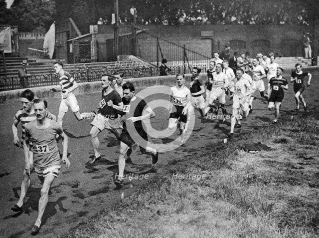 Running the half mile at the Civil Service Sports day, Stamford Bridge, London, 1926-1927. Artist: Unknown