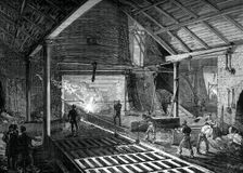 Running the molten iron into the pigs, c1880