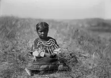 Running Owl's daughter, c1910. Creator: Edward Sheriff Curtis
