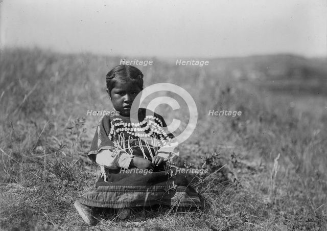 Running Owl's daughter, c1910. Creator: Edward Sheriff Curtis.