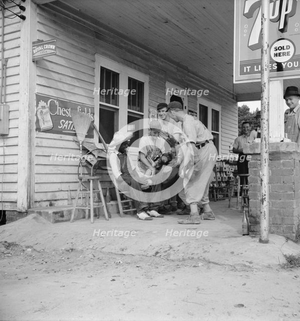 Rural filling station becomes community center..., near Chapel Hill, North Carolina, 1939. Creator: Dorothea Lange.