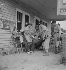 Rural filling station becomes community center..., near Chapel Hill, North Carolina, 1939. Creator: Dorothea Lange