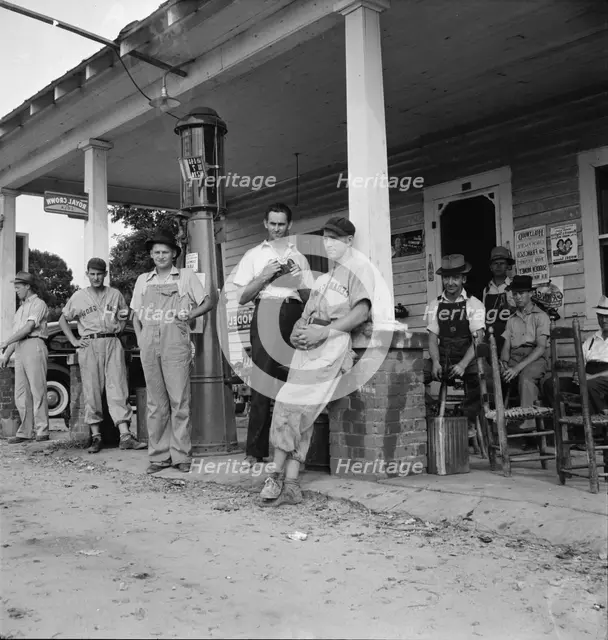 Rural filling stations become community centers, near Chapel Hill, North Carolina, 1939. Creator: Dorothea Lange.