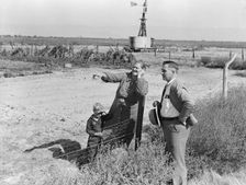 Rural rehabilitation client talking with county supervisor, FSA, Tulare County, California, 1938. Creator: Dorothea Lange