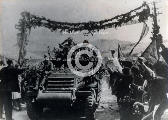 Russian troops entering the village of Dolno Kamartsi, Bulgaria, September 1944. Artist: Unknown