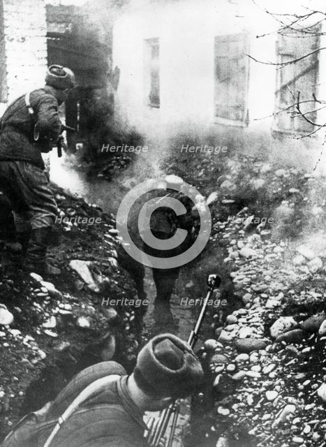 Russian troops liberating a village near Ordhonikidze, Caucasus, 1942. Artist: Unknown
