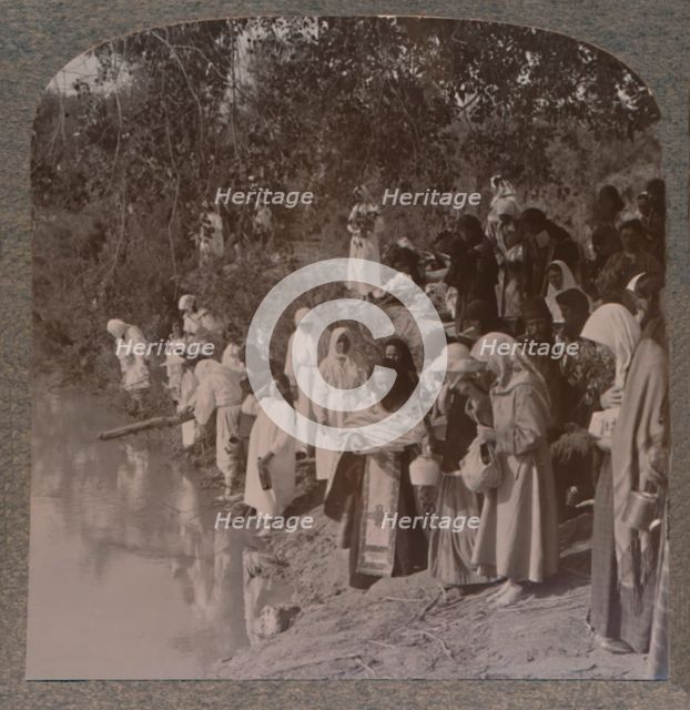 'Russian women holding service on the banks of the Jordan', c1900. Artist: Unknown.