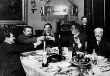 Russian author Alexander Kuprin with friends in Paris, 1930s. Artist: Anon