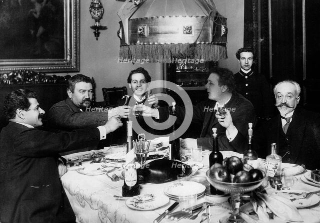 Russian author Alexander Kuprin with friends in Paris, 1930s.  Artist: Anon