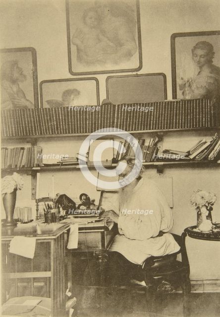 Russian author Leo Tolstoy at work, 1890s. Artist: Sophia Tolstaya