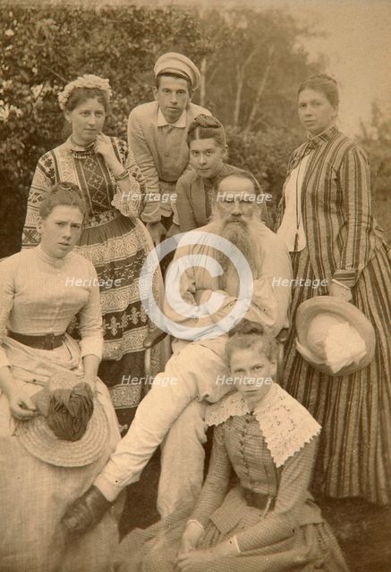 Russian author Leo Tolstoy with his family, Yasnaya Polyana, Russia, late 19th century(?).  Artist: Semyon Abamalek-Lazarev
