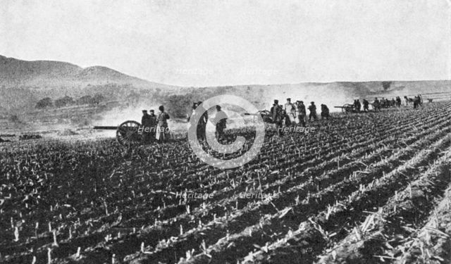 Russian field artillery in the millet field, Russo-Japanese War, 1904-5. Artist: Unknown