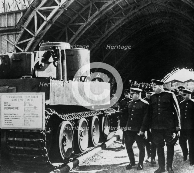 Russian generals inspecting an exposition of captured German armaments, Russia, 1943. Artist: Unknown