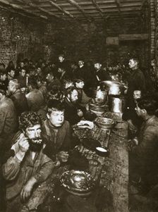 Russian manual labourers eating a meal, late 19th century. Creator: Unknown
